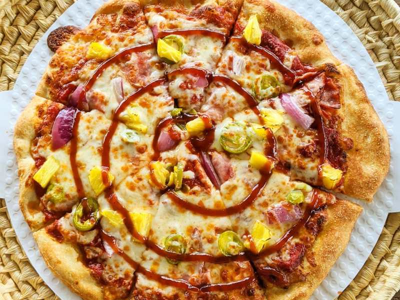 a slice of pizza on a plate